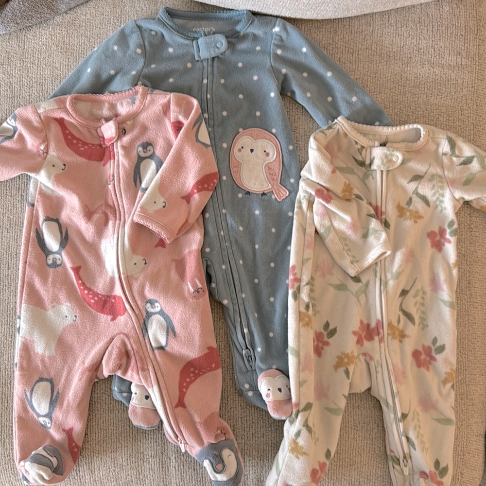 3 pack girls fleece footed sleepers. Good used condition.